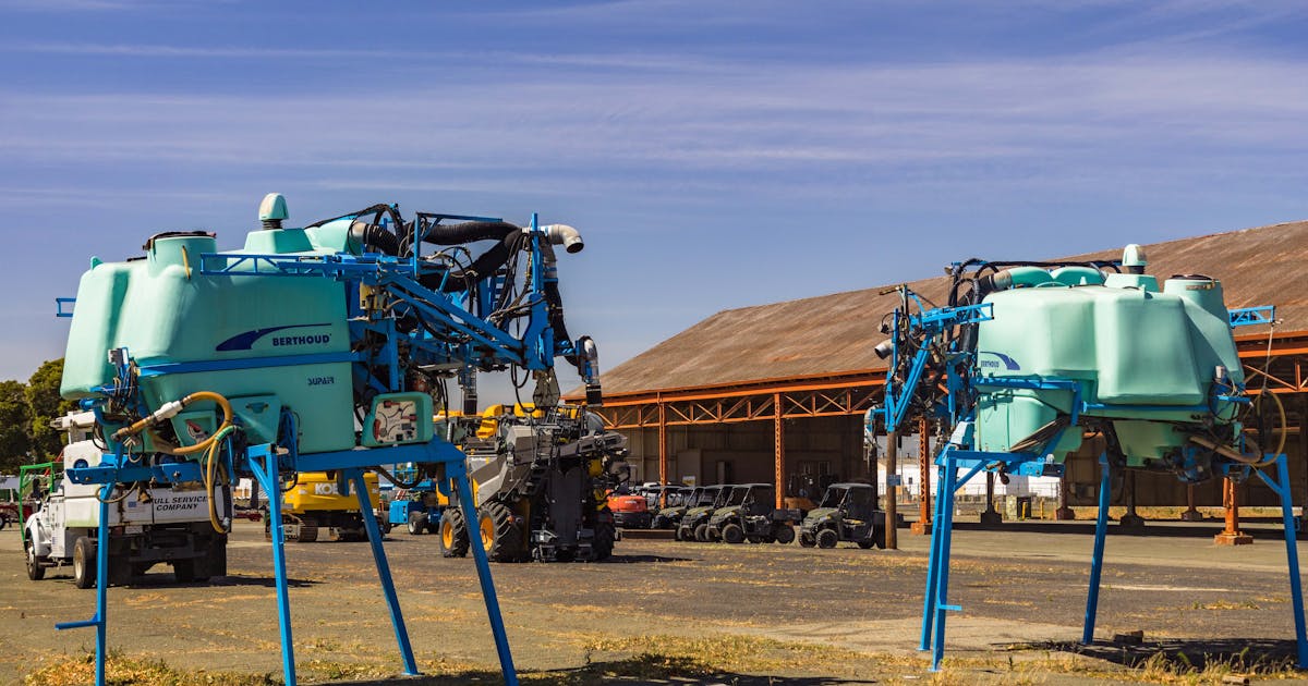 Equipment rental yard with machinery